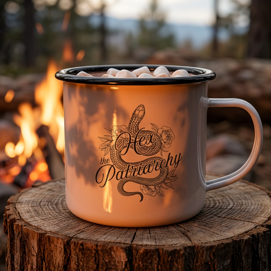 Hex the Patriarchy enamel camping mug featuring a feminist snake and witch-inspired design for coffee, tea, camping, and cozy mornings.