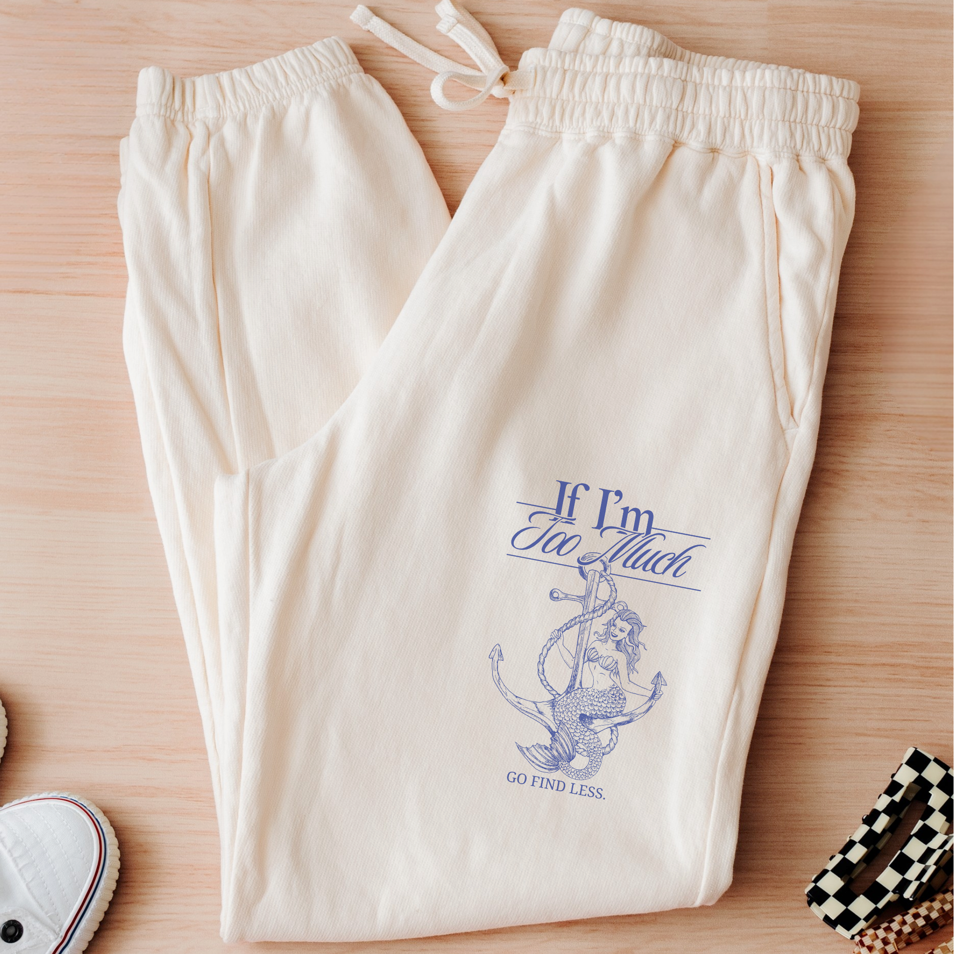 If I'm Too Much, Go Find Less feminist joggers featuring an empowering graphic quote on soft fleece sweatpants with a relaxed fit and side pockets.