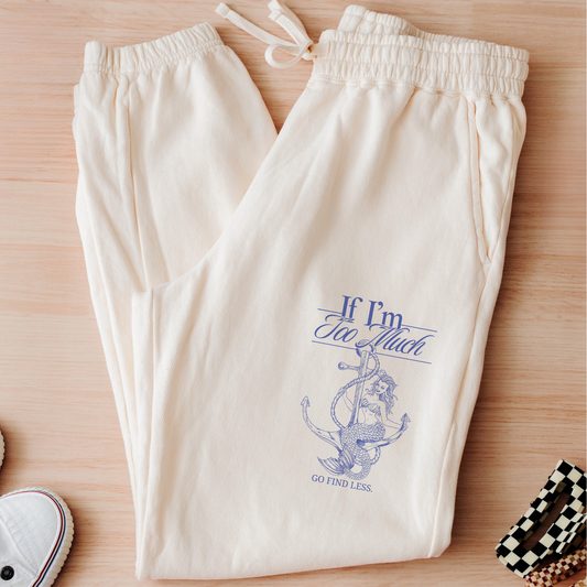 If I'm Too Much, Go Find Less feminist joggers featuring an empowering graphic quote on soft fleece sweatpants with a relaxed fit and side pockets.