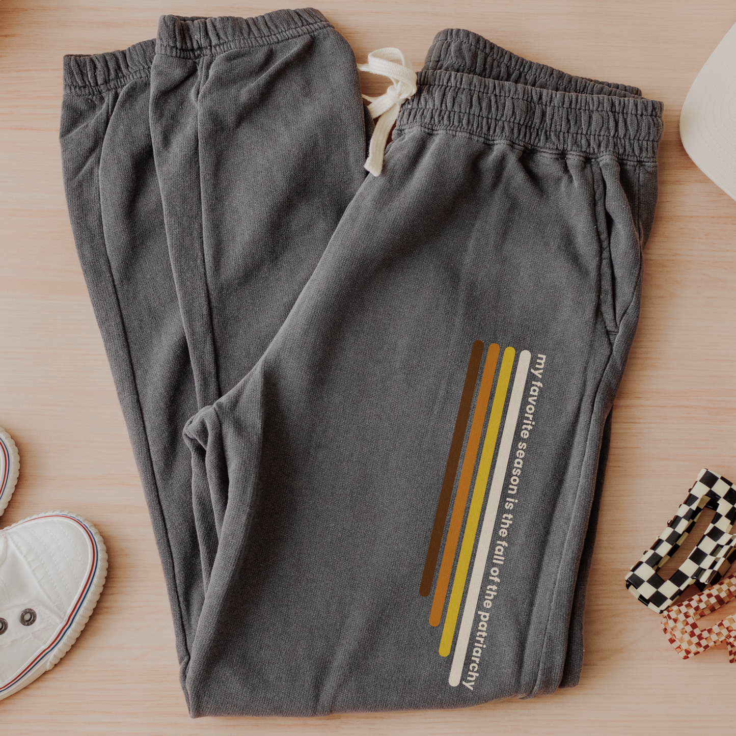 My Favorite Season Is the Fall of the Patriarchy joggers featuring funny feminist fall artwork on cozy fleece sweatpants for autumn and everyday wear.