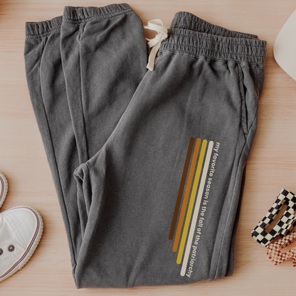 My Favorite Season Is the Fall of the Patriarchy joggers featuring funny feminist fall artwork on cozy fleece sweatpants for autumn and everyday wear.