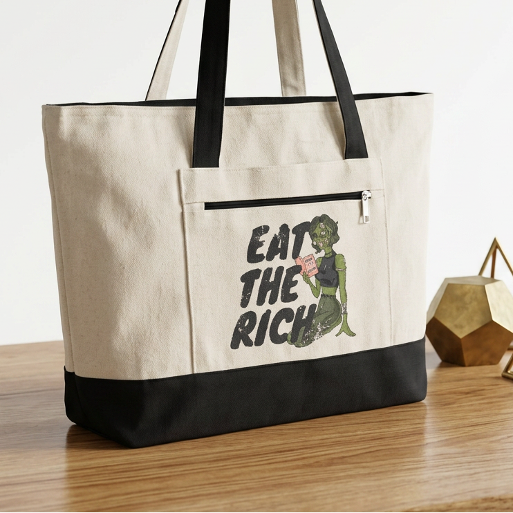 Eat the Rich zombie canvas tote bag featuring feminist political satire and retro horror artwork with roomy zippered storage.