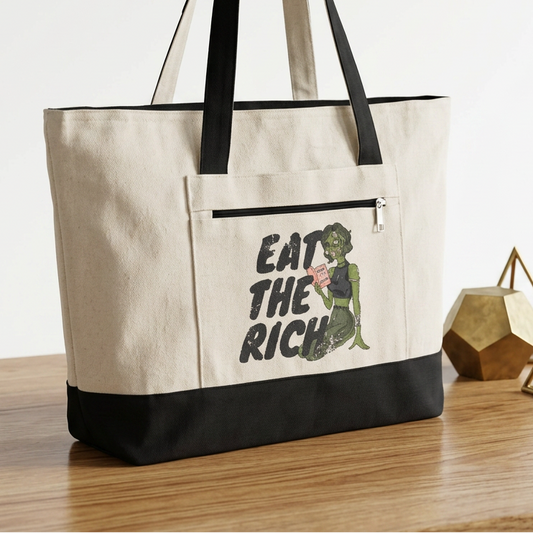 Eat the Rich zombie canvas tote bag featuring feminist political satire and retro horror artwork with roomy zippered storage.