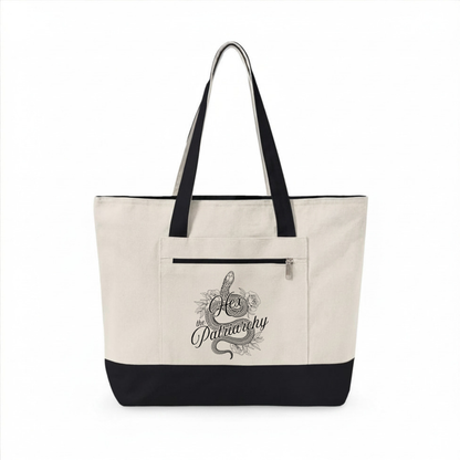 Hex the Patriarchy feminist canvas tote bag featuring a witchy snake design, zippered closure, and roomy everyday storage.