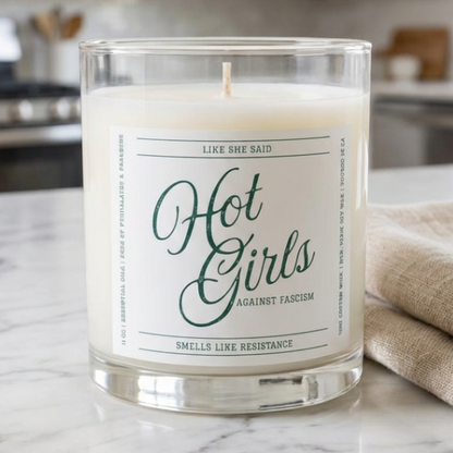 Hot Girls Against Fascism feminist candle featuring witty political satire for readers, activists, democracy supporters, and thoughtful home decor.