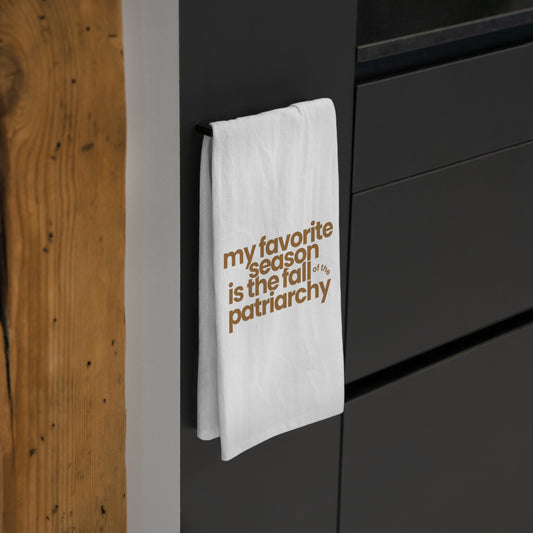 My Favorite Season Is the Fall of the Patriarchy cotton tea towel, a funny feminist kitchen towel for autumn decor, fall baking, and feminist gifts.