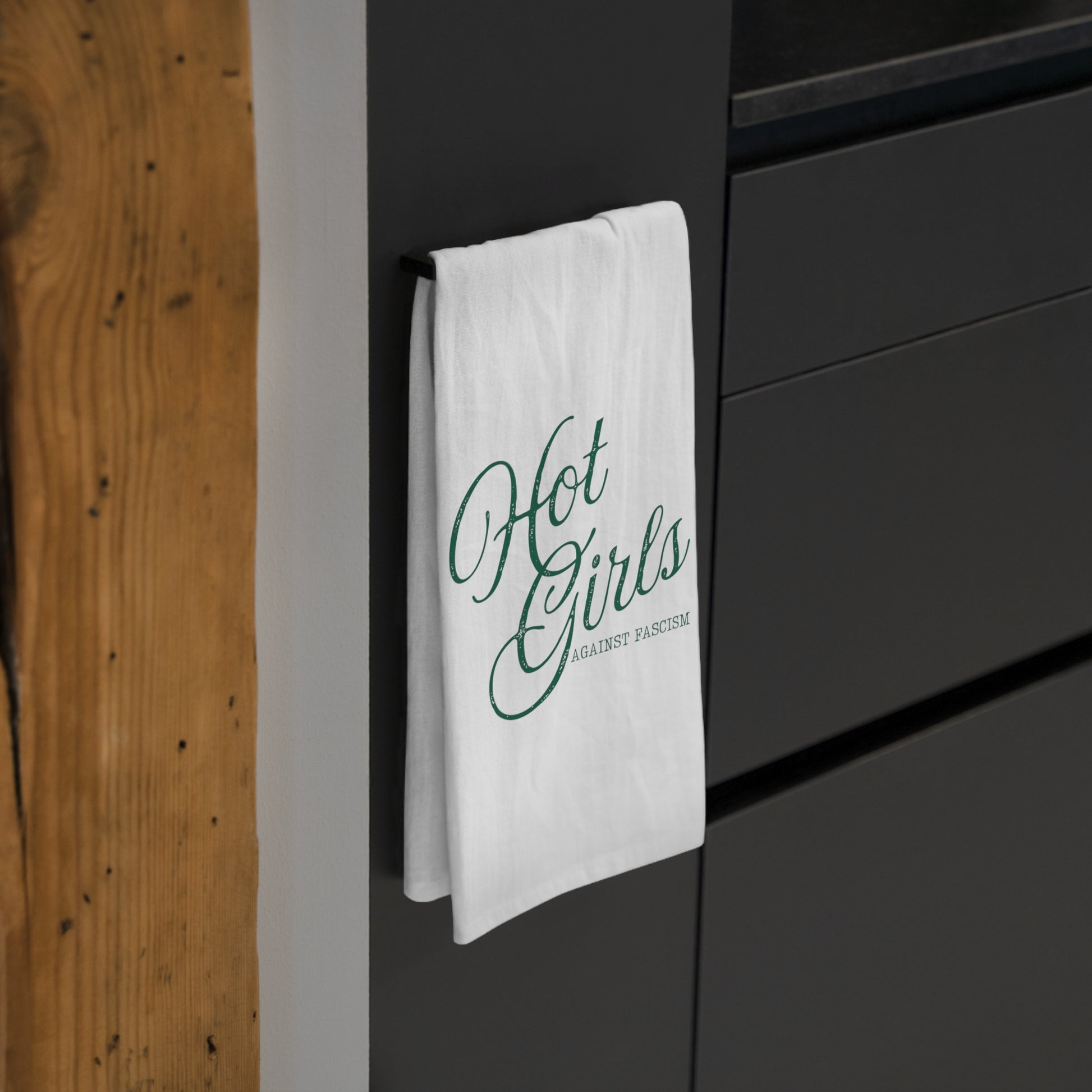 Hot Girls Against Fascism 100% cotton tea towel featuring witty feminist political humor for kitchen decor, housewarming gifts, and everyday use.