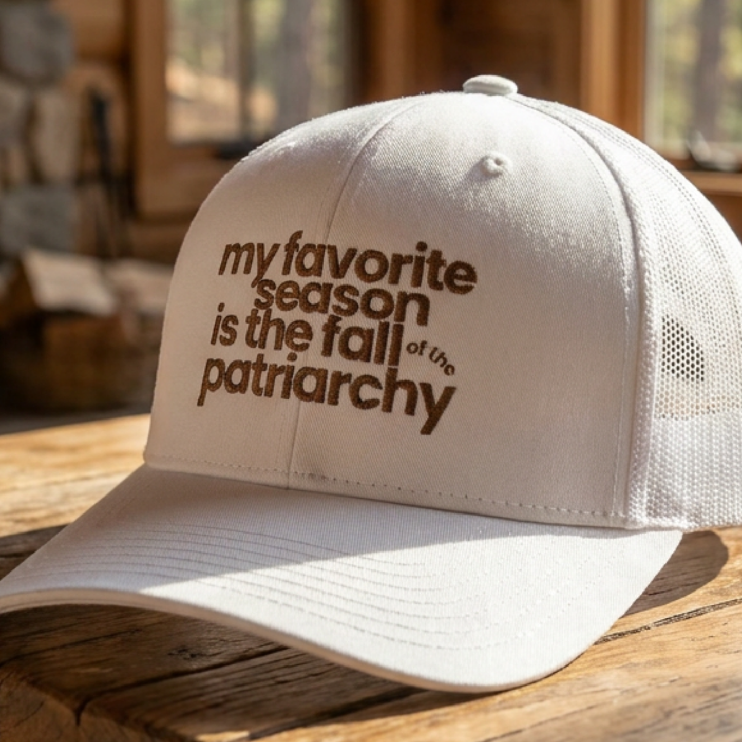 My Favorite Season Is the Fall of the Patriarchy embroidered trucker hat, a funny feminist fall cap celebrating women's rights and social change.