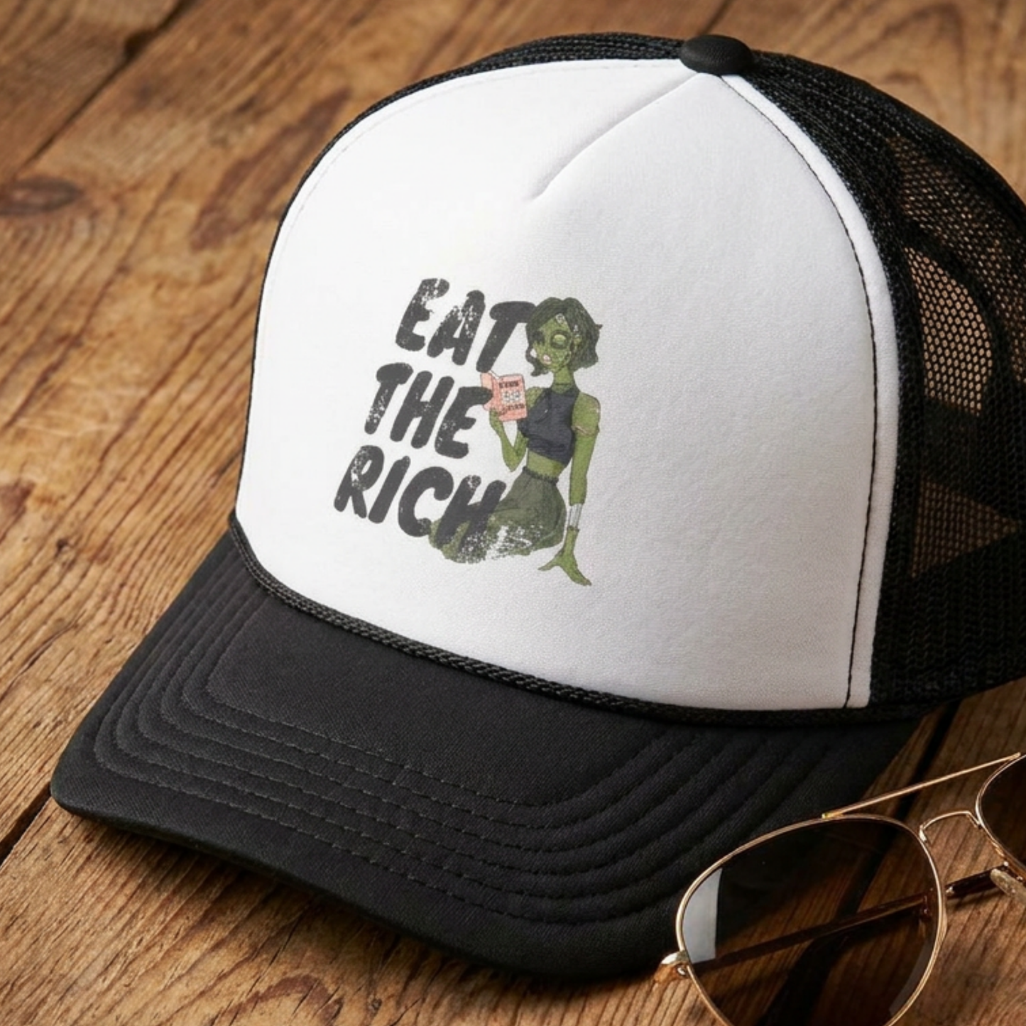Eat the Rich zombie feminist foam trucker hat with retro horror artwork, mesh back, and dark political satire for Halloween and spooky season.