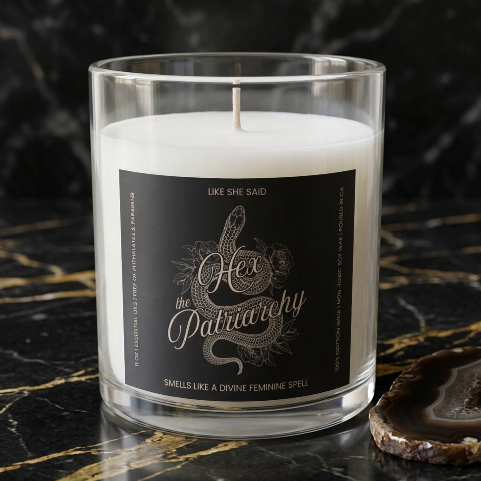 Hex the Patriarchy scented candle featuring a feminist snake design inspired by witchcraft, transformation, renewal, and feminine power.