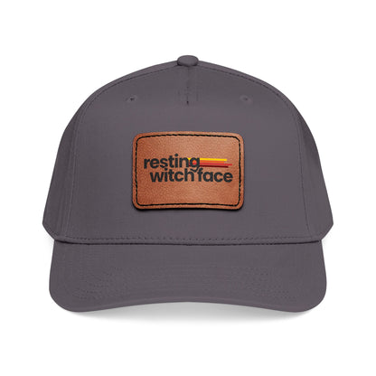 Resting Witch Face baseball hat featuring a light brown vegan leather rectangle patch with funny feminist witch design and vintage-inspired style.
