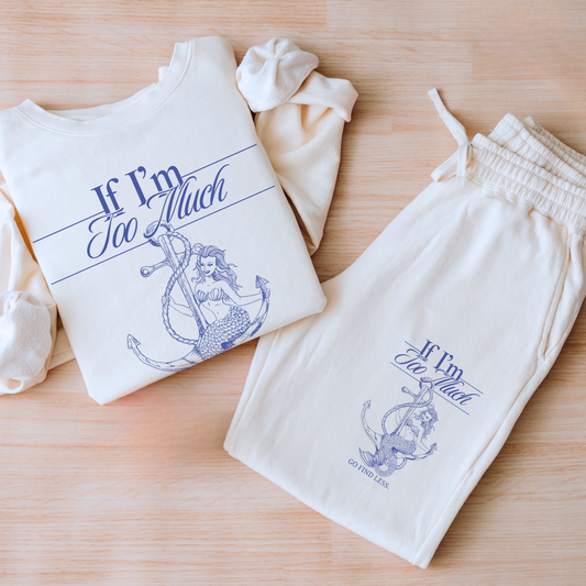If I'm Too Much Go Find Less mermaid sweatshirt featuring feminist empowerment artwork on a cozy graphic crewneck celebrating confidence and self-worth.